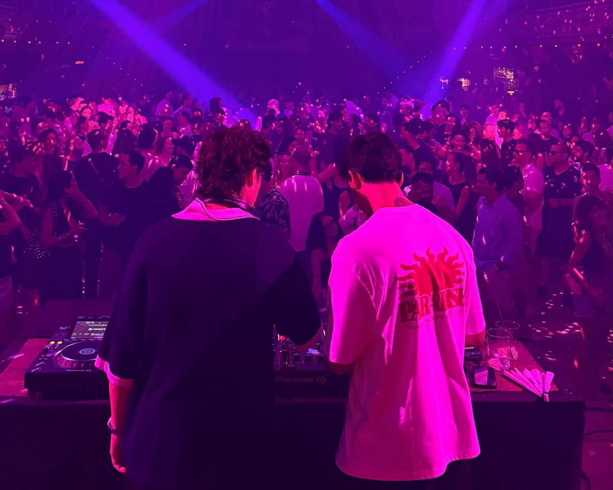 State Of Mind playing to a packed room under purple lights